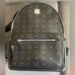 Brand new MCM Black Leather Back Pack, worn Twice!